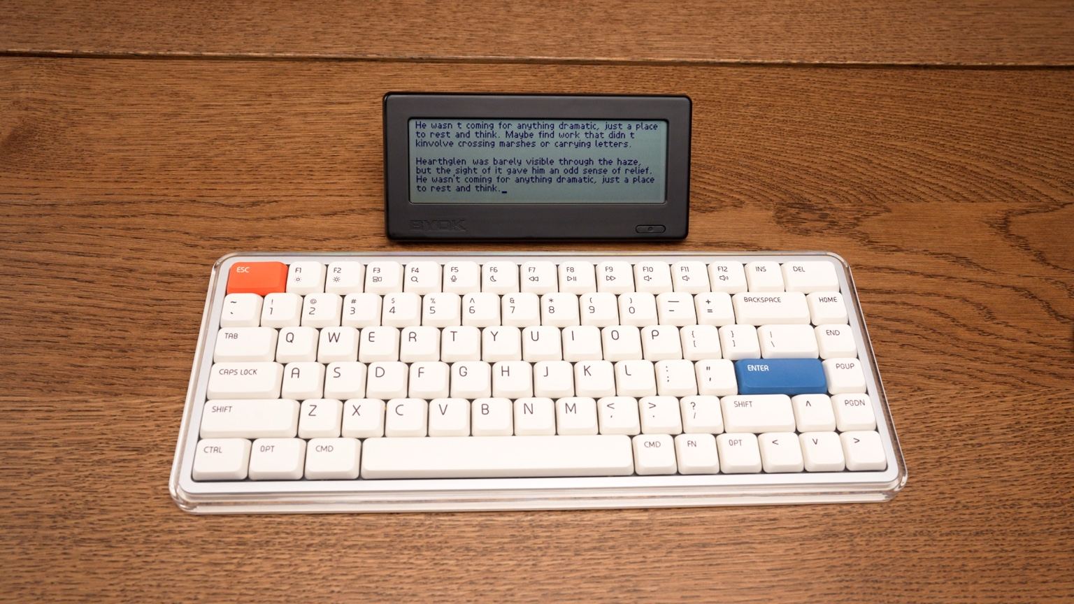 BYOK distraction-free writing device with keyboard on a clean writing desk